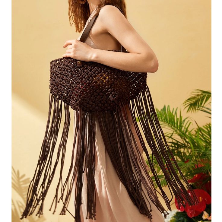 Crochet Braided Fringe Trimmed Tote Bag * Color: Brown *100% Cotton * Adjustable Double Handles * Length: 18.9” * Width 5.5” * Height 7.9” * Handle Height: 15.7” Bohemian Brown Bags For Beach Season, Brown Double Handle Beach Shoulder Bag, Chic Brown Beach Bags, Trendy Fringe Shoulder Bag For Summer, Brown Bohemian Bucket Bag For Beach Season, Summer Fringe Bags For Daily Use, Bohemian Brown Bucket Bag For Beach Season, Summer Brown Hobo Bag With Double Handle, Brown Tote Hobo Bag For Beach Season