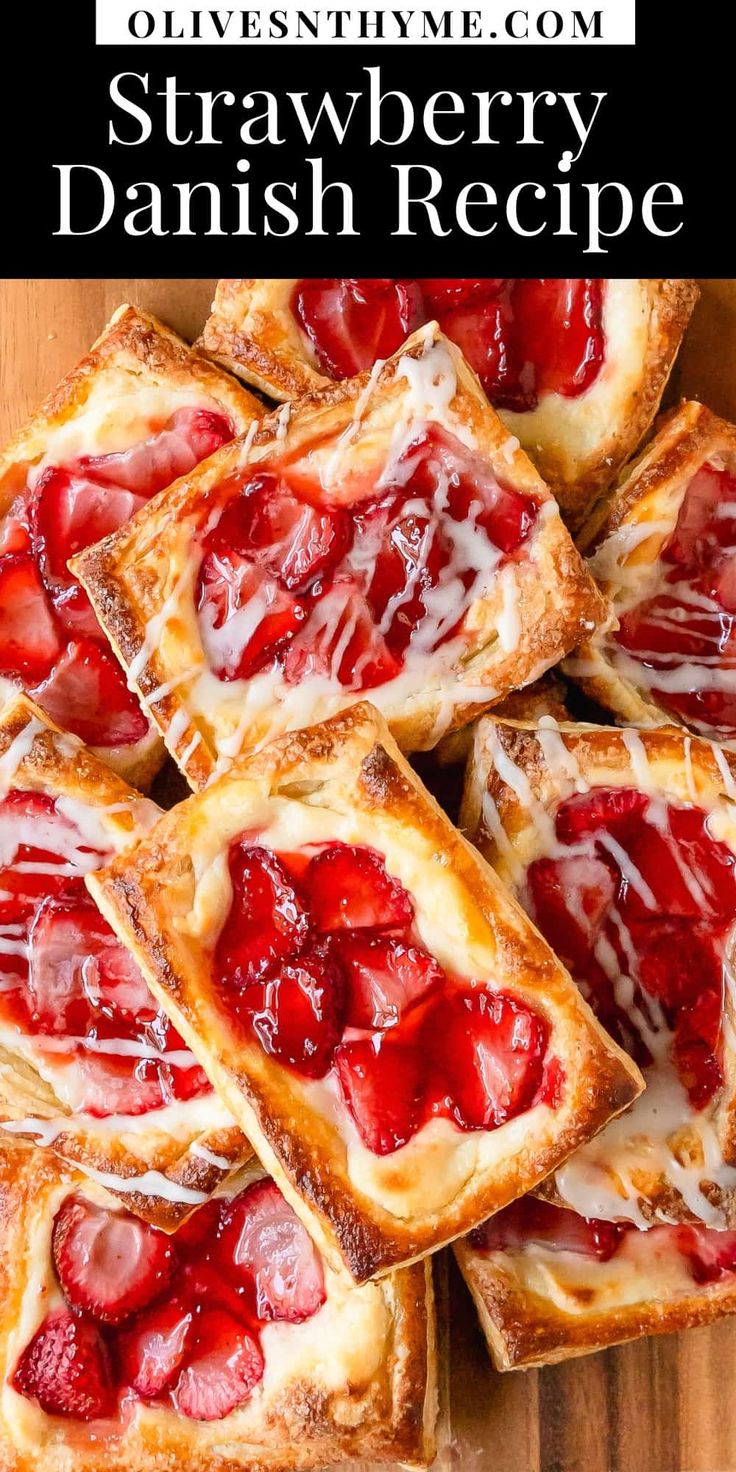 strawberry danish bread with cheese on top and strawberries in the middle, sitting on a cutting board