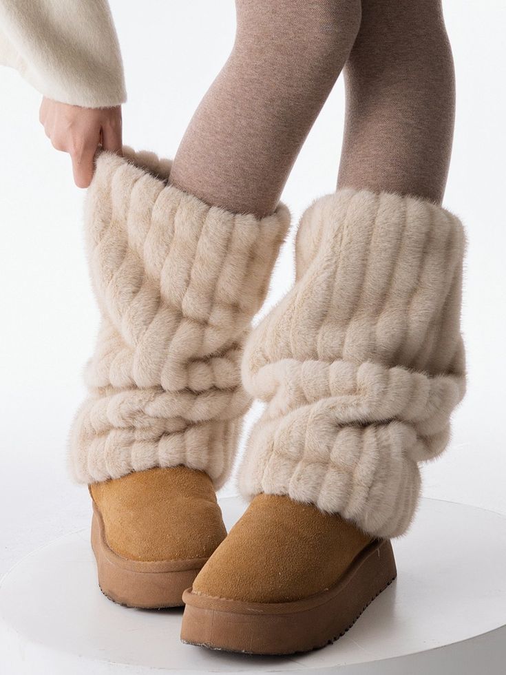 The price is for a pair of leg warmers only, others are not included. Garment Size SizeFree SizeFull Length40 Cute Fluffy Boots, Leg Warmers Uggs, Cozy Beige Bottoms For Winter, Cozy Beige Winter Bottoms, One Size Beige Leg Warmers For Winter, Cozy Footless Winter Bottoms, Cozy Footless Bottoms For Winter, Trendy Mid-calf Winter Bottoms, Trendy Mid-calf Bottoms For Winter