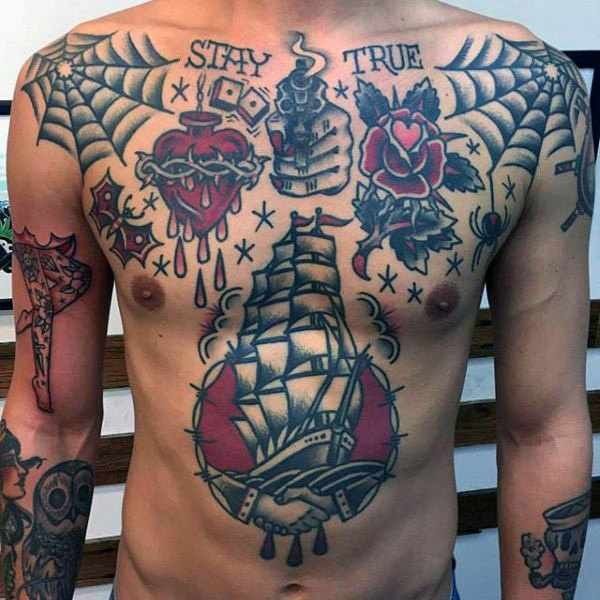 a man with lots of tattoos on his chest