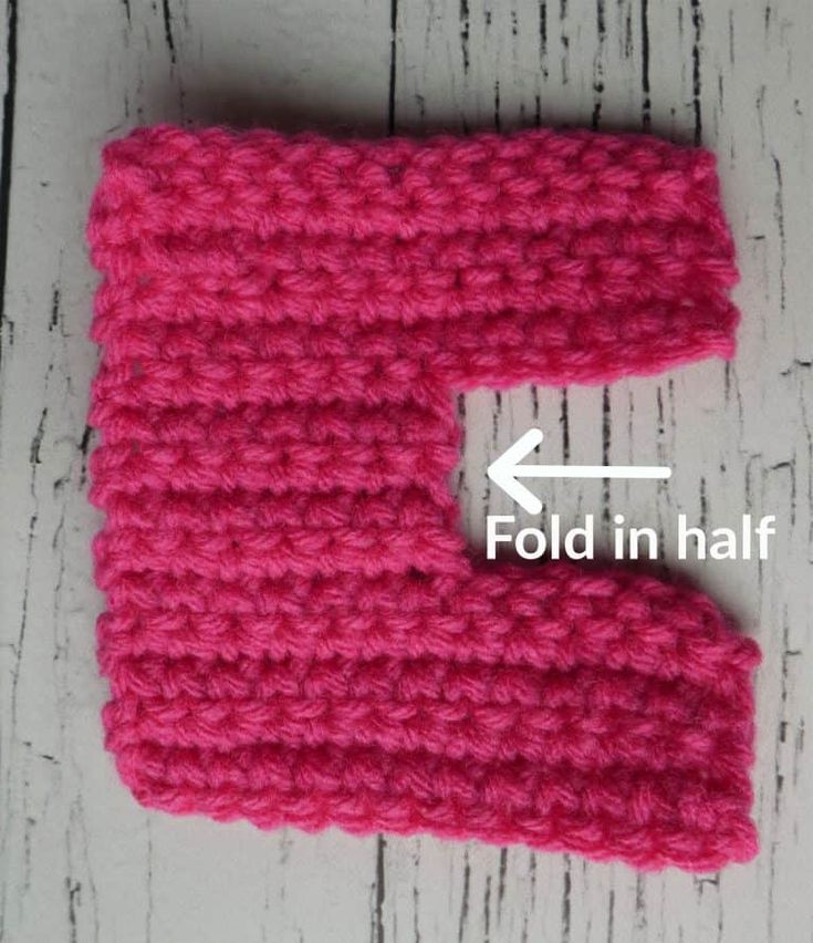 a crocheted pink object is shown with an arrow pointing to the left side