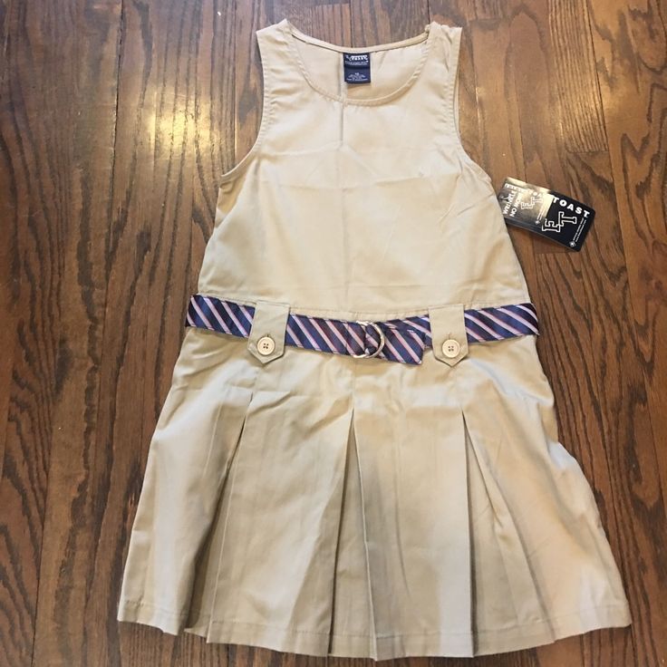 Tan Pleated Dress For Uniform At School. Spring Sleeveless School Uniform Dresses, French Toast Uniforms, Grey Jumper Dress, French Toast School Uniforms, Girls School Uniform, Plaid Jumper, Navy Uniforms, Uniform Dress, Girls School