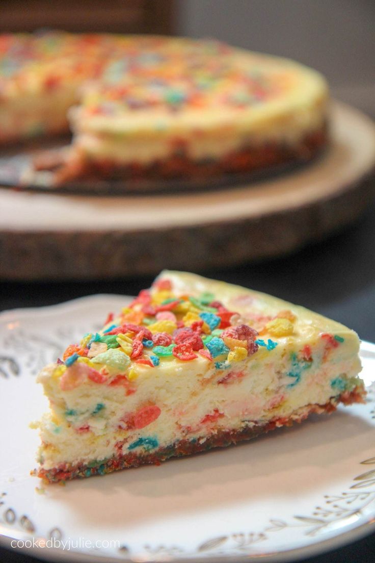 a slice of cake with sprinkles is on a plate