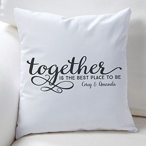 a white couch with a pillow that says together is the best place to be on it