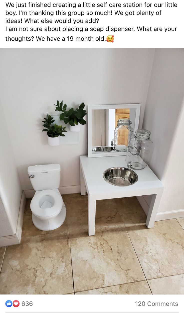 a bathroom with a sink, toilet and mirror on the wall next to each other