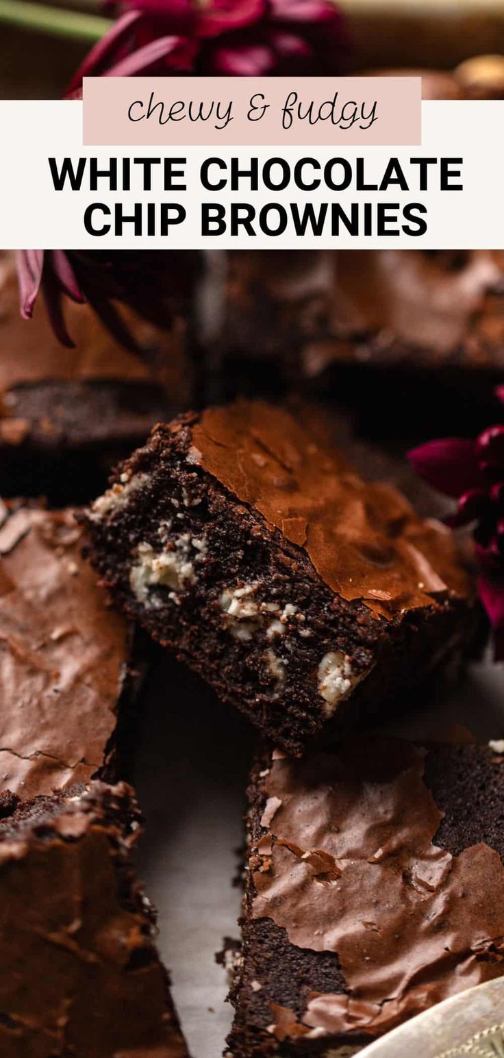 white chocolate chip brownies with flowers in the background and text overlay that reads chewy & fudge