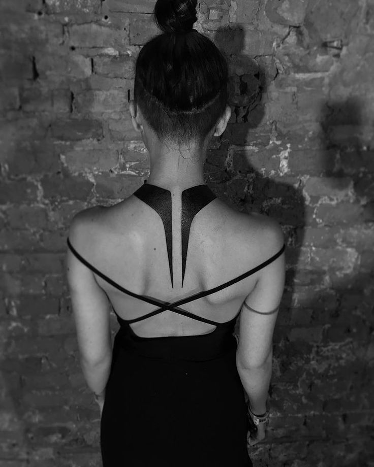 a woman with her back turned to the camera