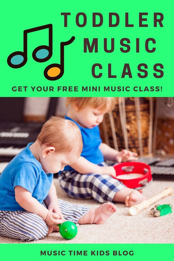 two toddlers playing with toys on the floor in front of a green banner that says toddler music class get your free mini music class