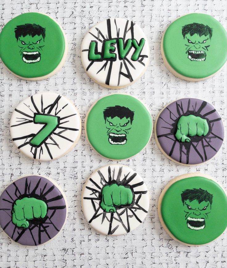 six decorated cookies with the hulk logo on them