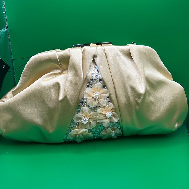 This Beautiful Satin Bag Comes With A Gold Chain Strap. The Gold Kiss-Lock Makes Any Bag An Eye Catcher Nwt Embellished Cream Bags For Events, Chic Beige Embellished Evening Bag, Elegant Rectangular Evening Bag For Spring, Elegant Rectangular Spring Evening Bag, Elegant Cream Party Bag, Embellished Cream Evening Bag, Cream Shoulder Bag For Evening, Cream Clutch Shoulder Bag For Party, Cream Party Clutch Shoulder Bag