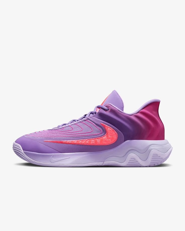 the nike zoom basketball shoe in purple and pink