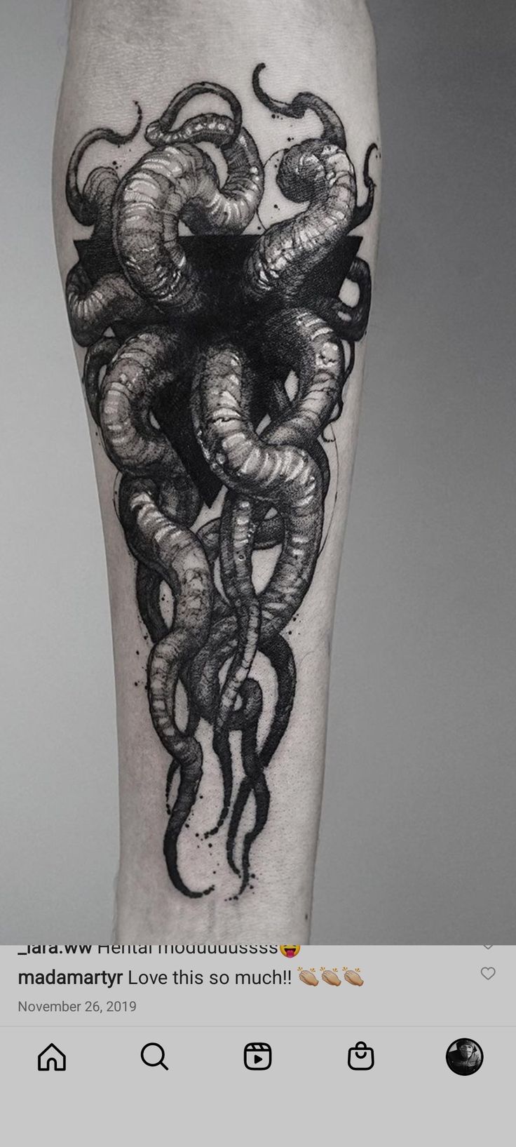 an octopus tattoo on the leg with black ink and white ink, it looks like they are