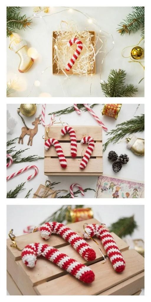 some candy canes are sitting on top of a wooden box with christmas decorations around them