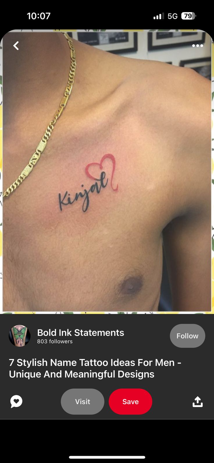 a man with a heart tattoo on his chest