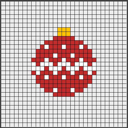 a cross stitch christmas ornament in red and white, with a yellow top