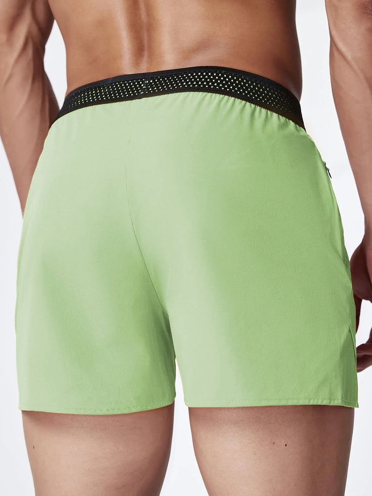 Gear up for warm weather runs in these men's running shorts designed for performance in the heat. The ultra-light polyester fabric actively wicks moisture to keep you dry as temperatures climb. The 3 inch inseam provides a supportive fit without restricting stride length or range of motion. Small zippered pockets give you space to store gels and other essentials on the go.Strive for a new personal record in these low-profile men's athletic shorts. Their streamlined 3-inch inseam provides an unre Breathable Mesh Running Shorts In Nylon, Nylon Running Shorts With Breathable Mesh, Green 4-way Stretch Nylon Athletic Shorts, Green Nylon Athletic Shorts With 4-way Stretch, Moisture-wicking Shorts For Trail Running In Summer, Lightweight Nylon Athletic Shorts For Running, Breathable Compression Athletic Shorts For Outdoor Activities, Breathable 4-way Stretch Green Shorts, Green Breathable 4-way Stretch Shorts