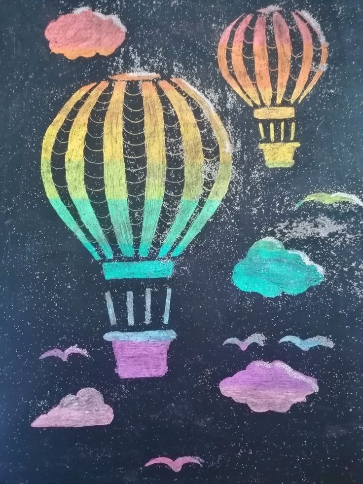 chalk drawing of hot air balloons in the sky