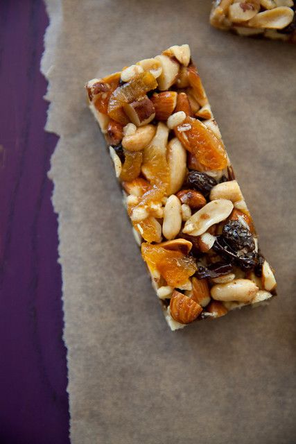 some kind of granola bar with nuts and raisins on it