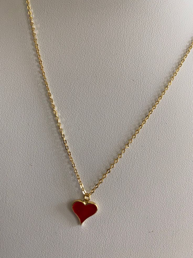 Love this red heart enamel gold necklace that can also be flipped and worn as just a gold heart necklace! Red Heart Necklace With Clavicle Chain, Red Heart Clavicle Chain Necklace, Gold Jewelry With Heart Graphic For Valentine's Day, Gold Enamel Heart Necklace For Gift, Red Heart Charm Necklace With Clavicle Chain, Red Heart Pendant Necklace With Clavicle Chain, Red Heart-shaped Clavicle Charm Necklace, Gold Enamel Heart Necklace For Valentine's Day, Gold Necklace With Double Heart And Heart Print