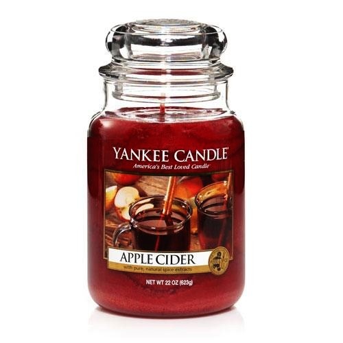 a jar of yankee candle with the label zombie orgy on it