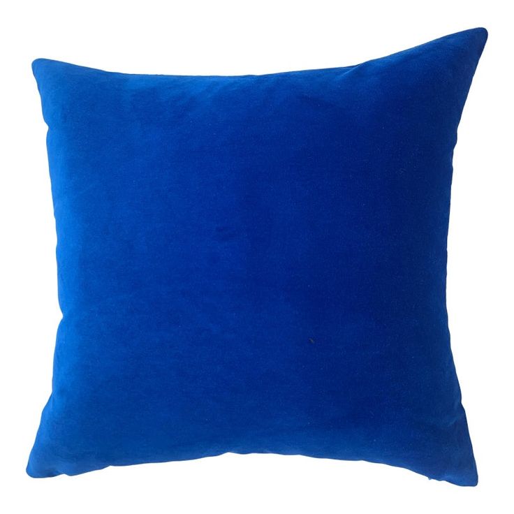 a blue pillow on a white background