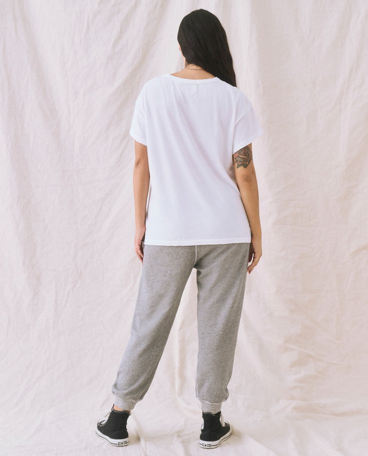 This worn in sweatpant is the perfected version of a vintage gym pant. Its drawstring waistband and ribbed cuffs make for a relaxed look. 100% Cotton Machine Wash Cold Tumble Dry Low Made in the U.S.A. Vintage Gym, Emily And Meritt, Army Pants, Sweat Pant, Gym Pants, Denim Jackets, Drawstring Waistband, Vintage Sweatshirt, Clothing And Shoes