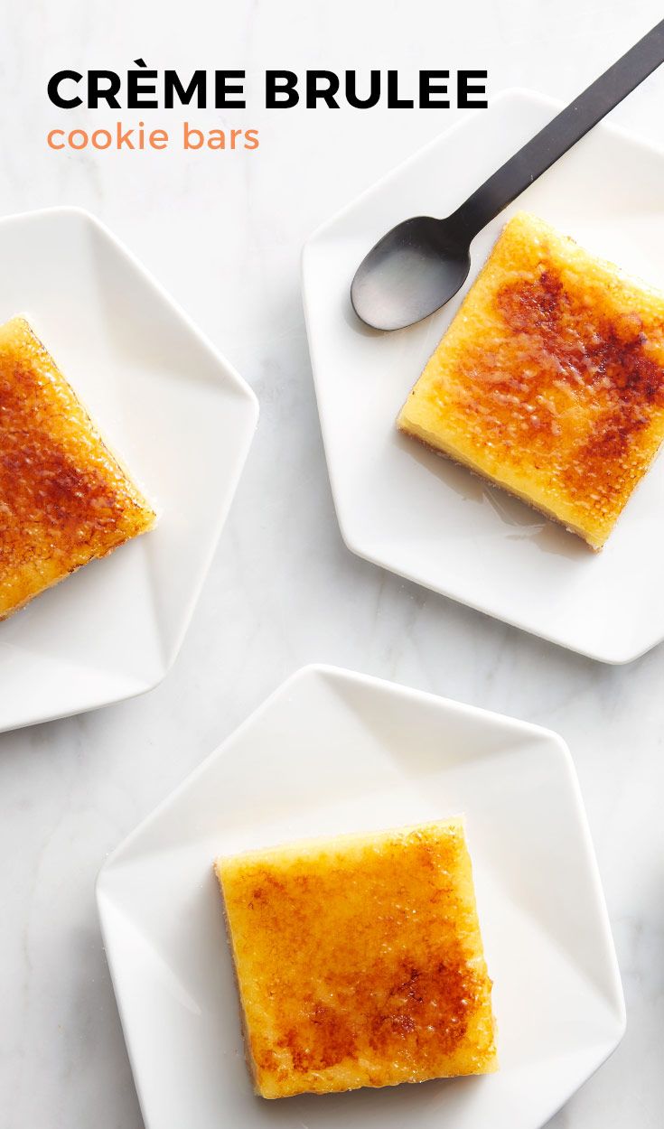 creme brulee cookie bars on white plates with spoons next to them