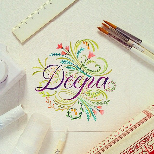 a screen shot of some art supplies on a white surface with the word depea written in cursive writing