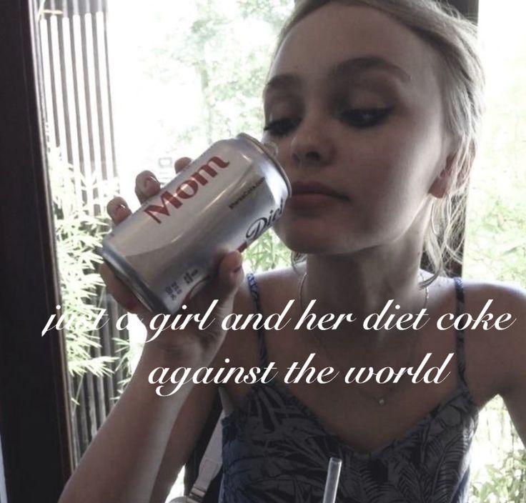 a woman drinking from a can with the words, it's girl and her diet coke against the world