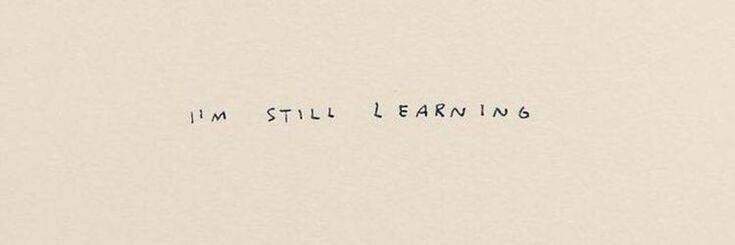 the words i'm still learning are written in black ink on a white paper