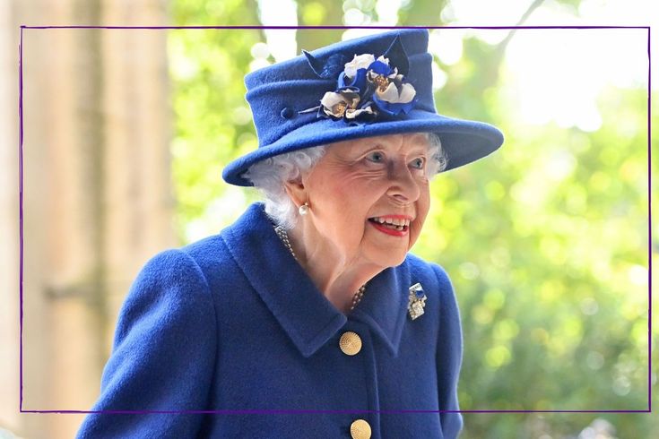 an older woman wearing a blue coat and hat