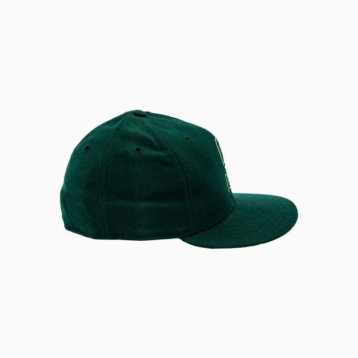 a green baseball cap on a white background