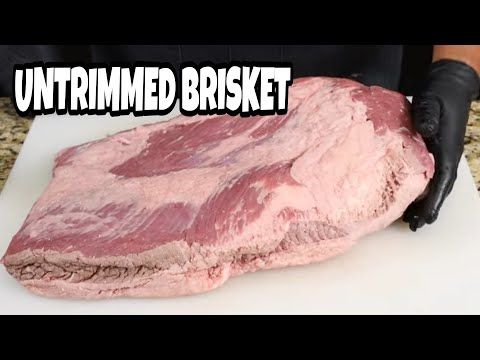 a large piece of meat on top of a cutting board with the words unrimmed brisket over it