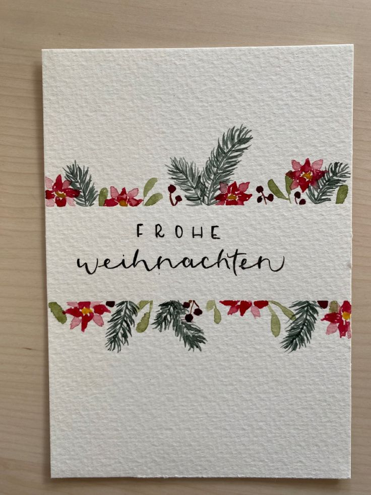 a christmas card with holly and poinsettis on white paper that says, frohe weinhachen