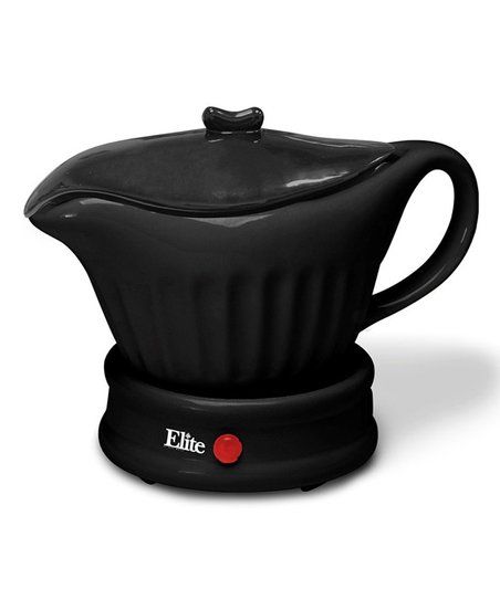 a black coffee pot sitting on top of a saucer with a red dot in the center