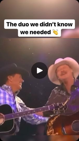 two men in cowboy hats are playing guitar and singing into each other's mouths