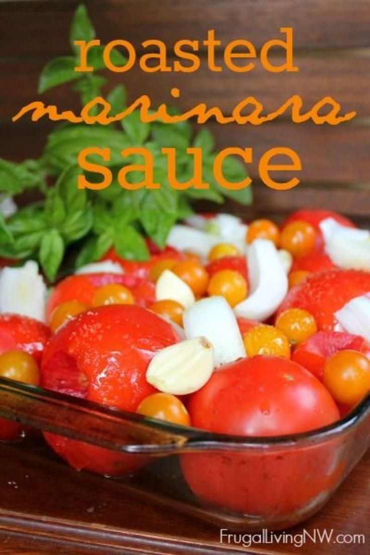 a glass dish filled with tomatoes and other vegetables