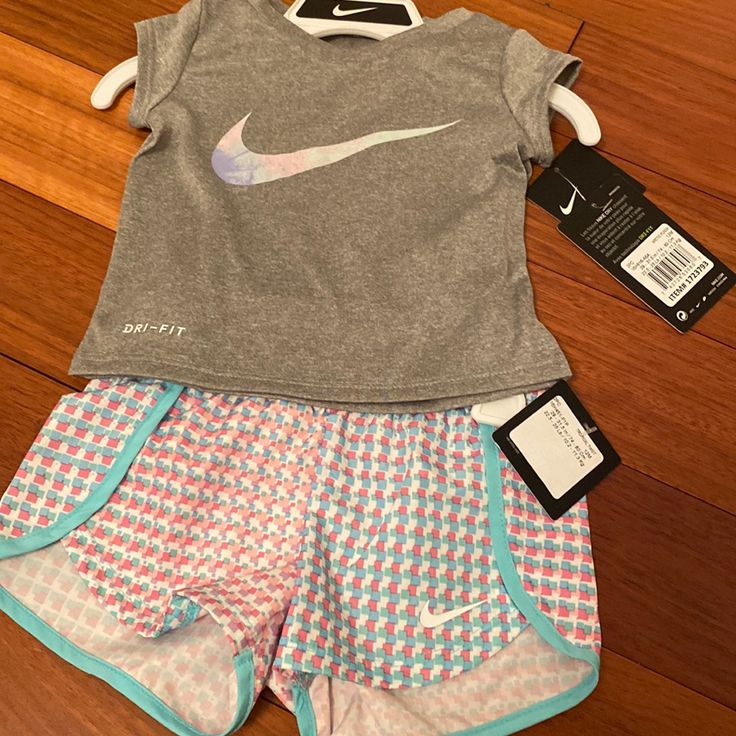 Nike Girls 2pc Set Playful Sports Cotton Sets, Pink Short Set For Playwear, Cute Pink Short Set For Spring, Nike Cotton Playtime Sets, Sporty Multicolor Sets For Summer, Sporty Multicolor Summer Sets, Cute Pink Short Set For Playwear, Pink Short Sleeve Sports Set, Playful Nike Sports Sets