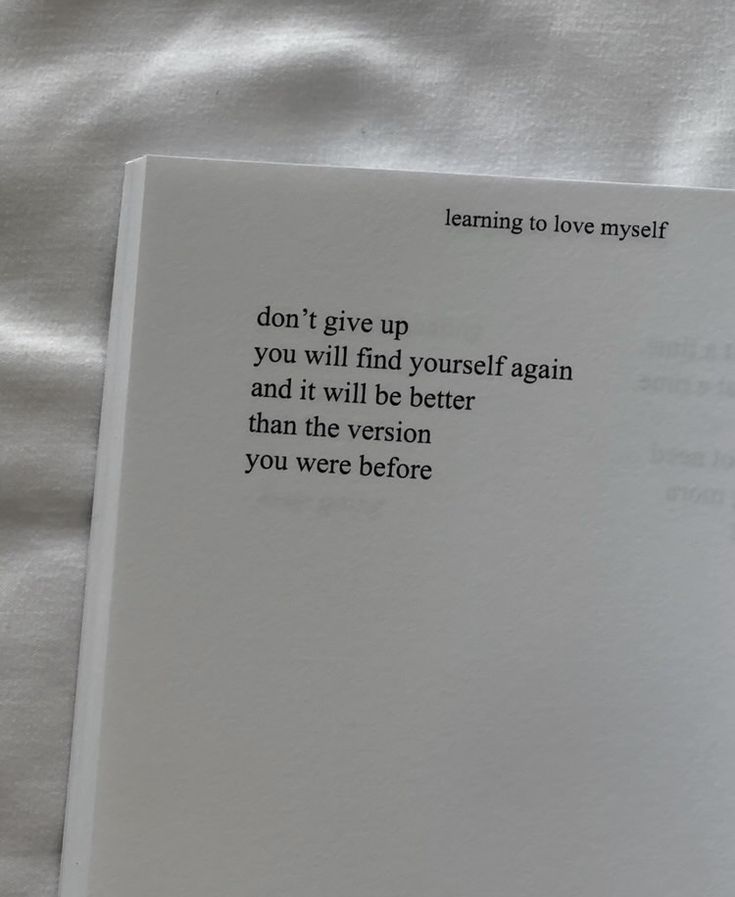 an open book with the words learning to love yourself on it