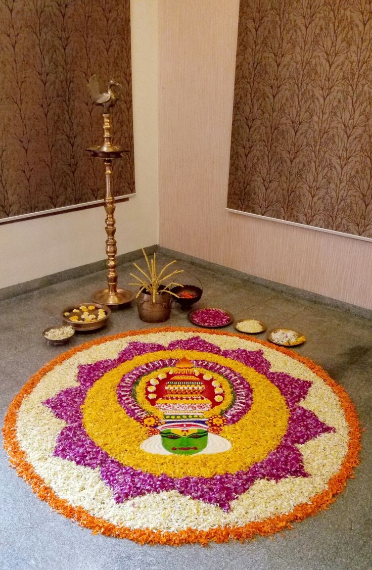 a decorated floor with flowers and candles