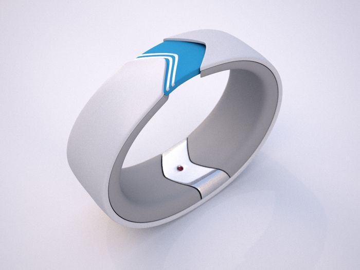 a white and blue ring with an arrow on it