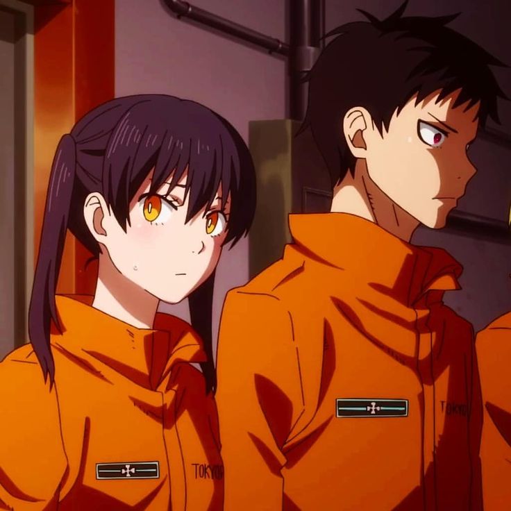 two anime characters in orange hoodies staring at the camera