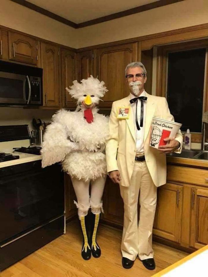 a man and woman dressed up in costumes