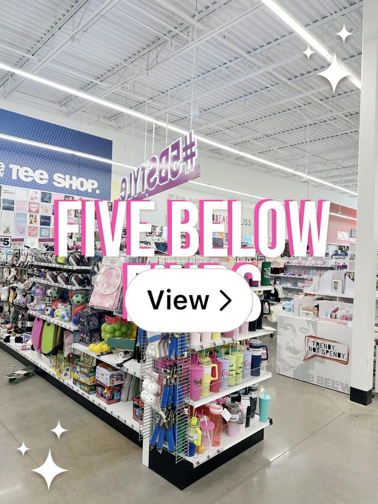 there is a sign that says five below in the middle of a store's aisle