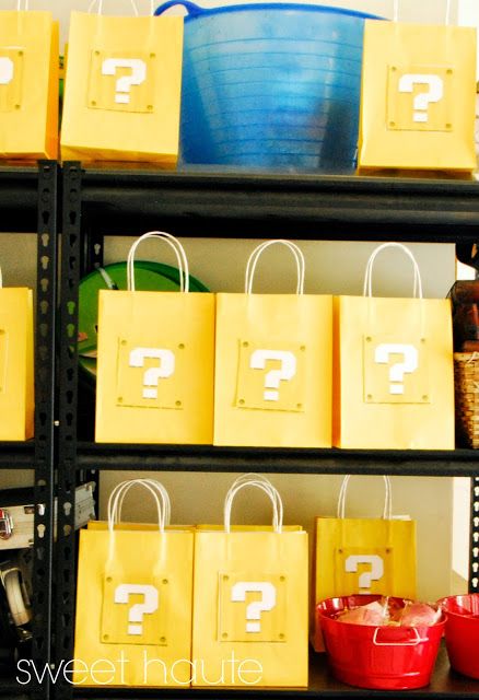 yellow shopping bags with question mark on them are sitting on shelves in a storage unit