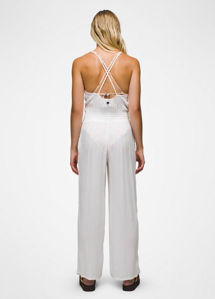 An effortless wide-leg jumpsuit made for pulling on over your swimsuit. Chic Wide-leg Jumpsuits And Rompers For Loungewear, Summer Strapless Overall Jumpsuit, Summer Wide Leg Jumpsuits And Rompers For Day Out, Stretch Beachwear One-piece Jumpsuit, Stretch Beachwear One-piece Jumpsuits And Rompers, Stretch One-piece Beachwear Jumpsuits And Rompers, Summer Stretch Jumpsuits And Rompers For Loungewear, Stretch One-piece Jumpsuits And Rompers For Beachwear, Spring Stretch Wide-leg Jumpsuits And Rompers