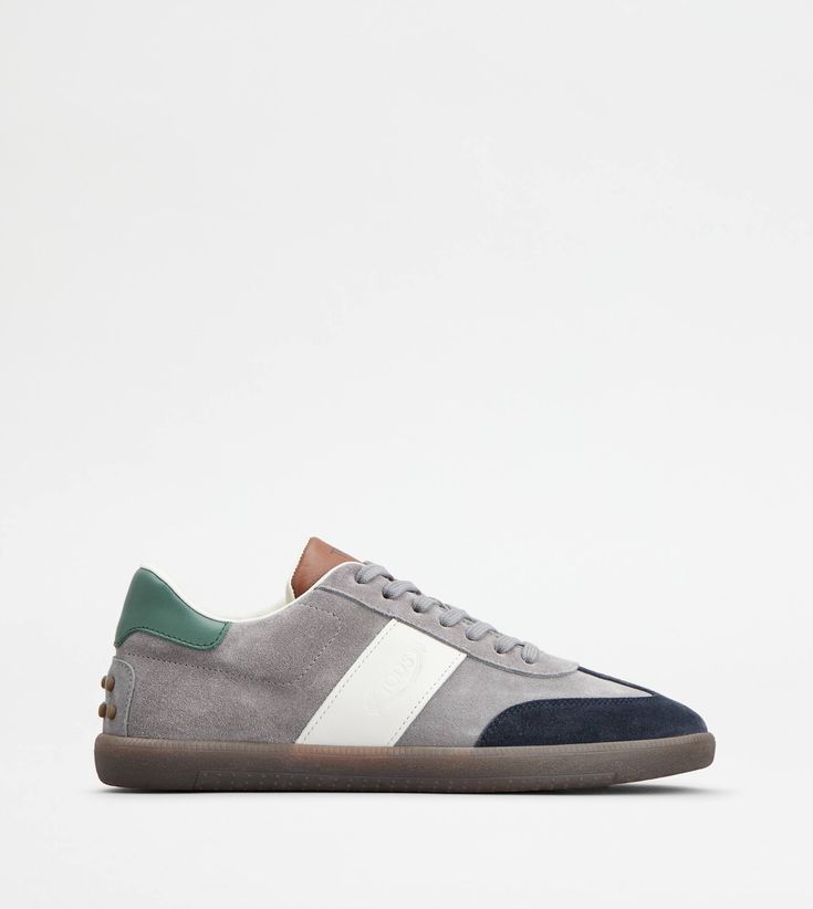 Tabs sneakers in soft suede with smooth leather inserts, logo stamped on the side and rubber outsole. An iconic style of Tod's world, with sober and refined lines. Gift Boutique, Grey And Beige, Logo Stamp, Affordable Luxury, Grey Blue, Brown Beige, Soft Suede, Trainers Women, Green And Brown