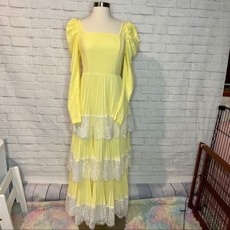 Free Shippingthis Yellow Dress Is Size Xs And Brand New! It Was Only Worn For The Second Photo. It Features A Tiered Design With White Lace Trim Along With Leg Of Mutton Sleeves For A Dramatic Finish. The Squared Neckline Is Super Flattering On Anyone. There’s A Hidden Zipper On One Side To Get The Dress On/Off With Easeall Photos Are Minemade Of 95% Polyester And 5% Spandex Measurements: Length-54” Bust-30”-38” Waist-26” Relaxed Shoulder-21” Sleeve-25” Yellow Long Sleeve Ruffled Maxi Dress, Yellow Ruffled Long Sleeve Maxi Dress, Yellow Long Sleeve Maxi Dress With Ruffles, Yellow Fitted Dress With Lace Trim, Southern Belle Dress, Kimono Mini Dress, Xxxl Dress, Squared Neckline, Leg Of Mutton Sleeve