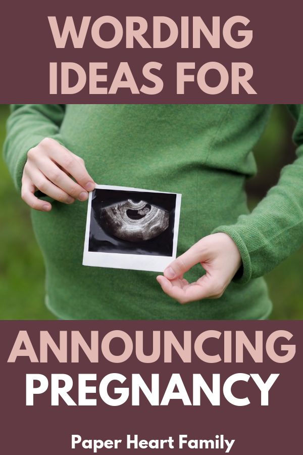 a woman holding an open photo in her hands with the words wording ideas for announcing pregnant