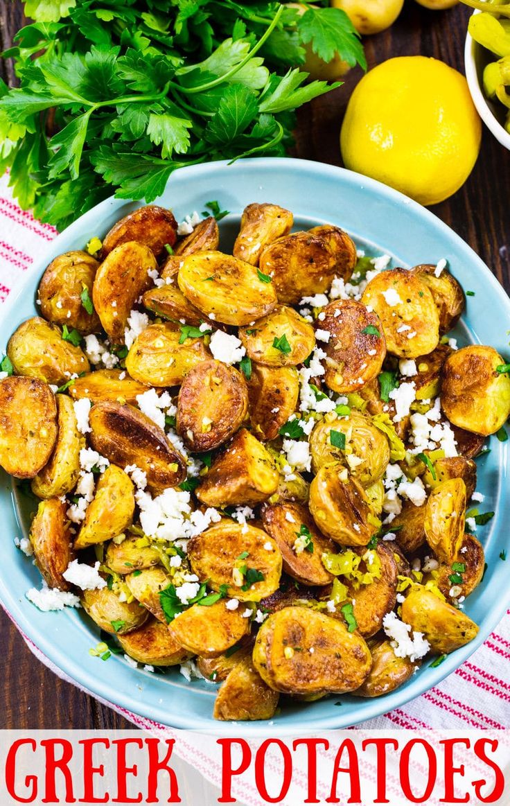 a blue bowl filled with fried potatoes and garnished with parmesan cheese